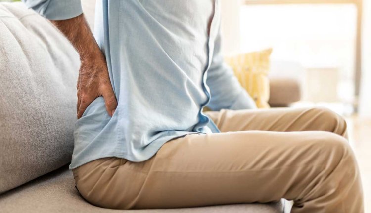 man met lage rugpijn