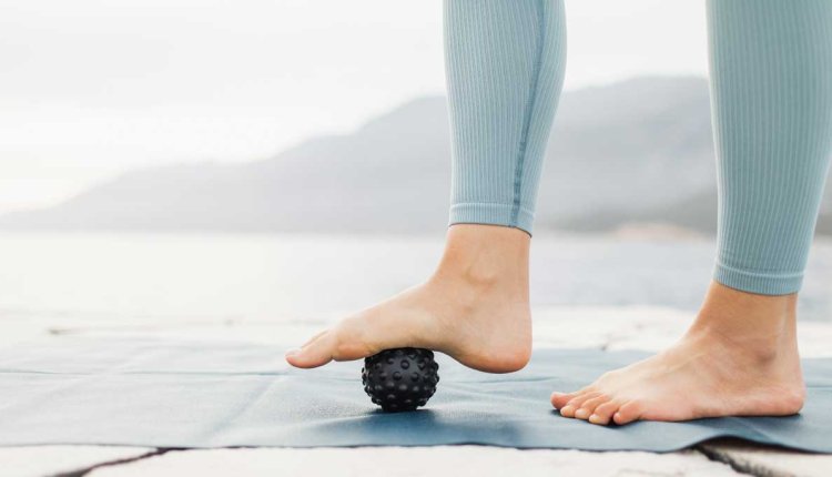 Vrouw doet voetoefeningen