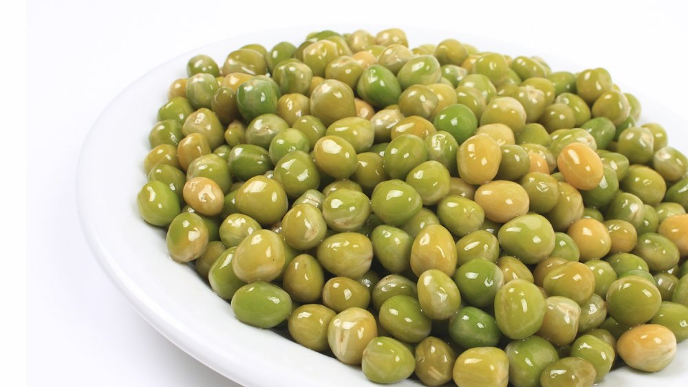 Jonge kapucijners met tomaat en ham