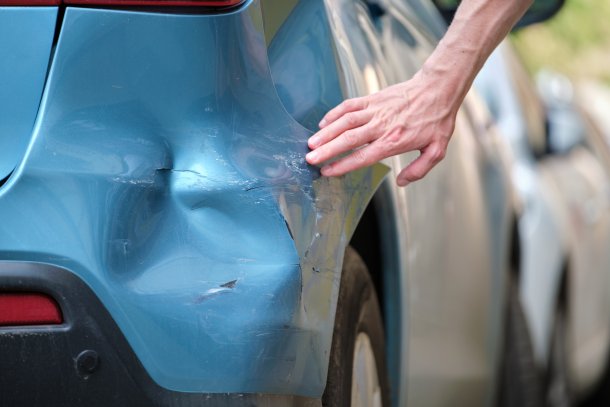 Deuk in de auto, parkeerschade